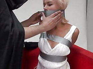 Blonde Girl Gagged in Duct Tape Bondage