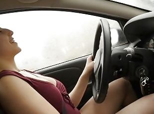 Short haired cutie Jenny masturbating her beaver while driving the car