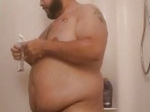 Fat arab showing off body in shower