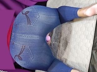 Big ass in jeans peeing with vibrator