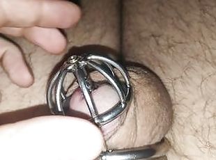 Stretching my urethra in chastity cage