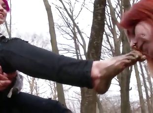 Lesbian slave is sucking fingers muddy feet