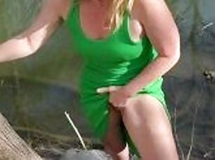 Masturbated to orgasm standing by the river