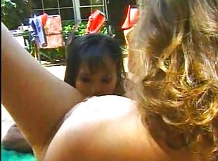 Poolside lesbian sex filmed excellently