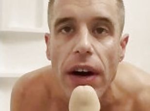Hot guy gets wet and sucks cock in the shower