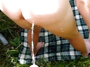 My hot stepmom Josie spreads her ass and I pee into it. Outdoor piss action.