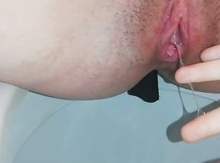 My pussy is madly flowing with slime and experiencing a wet orgasm