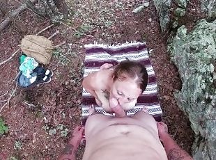 Redhead with big boobs sucks dick and swallows load in the woods