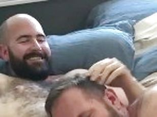 Two Mature Daddy Bears share a furry cub