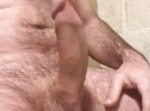 Stroking 9 inch cock before going in the shower