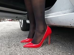 Lady driving in high heels & nylon stockings