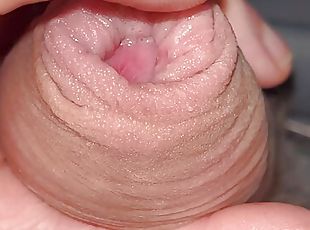 Wet foreskin close up.