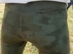 Chinese milf walk in park peeing in pants.