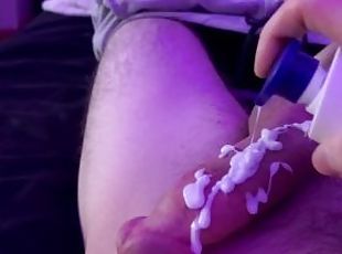 Dumping lotion all over my cock
