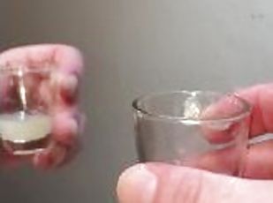 Cum play!- I fling a couple of my saved cum loads out of a shot glass onto a mirror to drip down