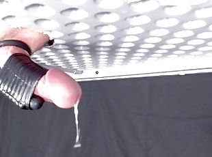 Milking my dick with vibrator sleeve while wearing cock and ball rings. Big cumshot.