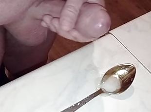 the wife excited her husband with a blowjob. the husband jerked off and finished in a spoon.