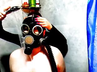 Halloween is coming! Scary video of a gas mask fetish in the shower